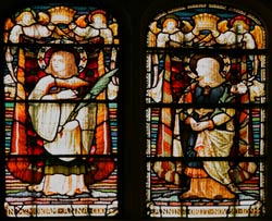 Stained glass window to the right of the altar