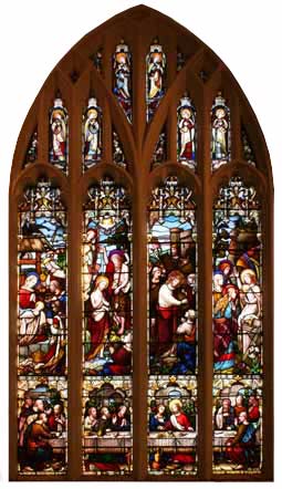 Stained glass window behind altar